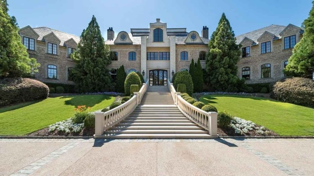 Steve Harvey's House Interior Imperial Staircase in Atlanta, Georgia (Source: Georgia MLS)